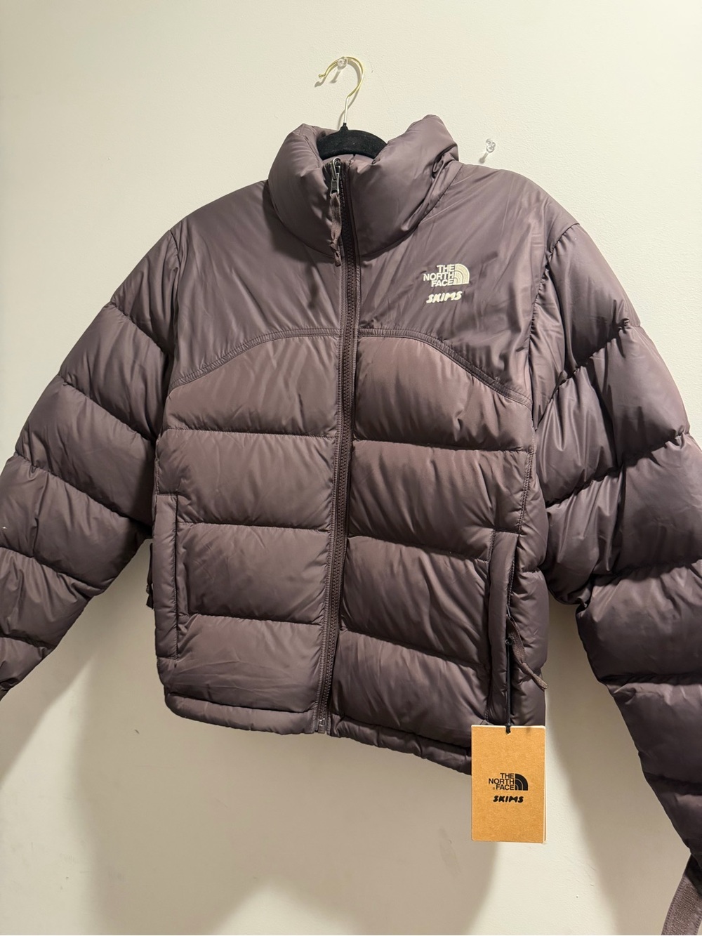 SKIMS Puffer Jacket in Dark Taupe with Light Embroidery